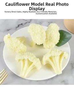 Detailed macro view of realistic PVC cauliflower model displayed on a ceramic plate