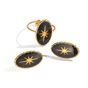 Classic black and gold starburst earring and oval ring set in stainless steel