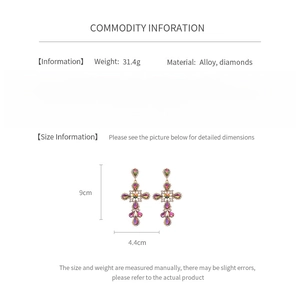 Detailed sizing guide showing the 9cm by 4.4cm dimensions of vintage cross earrings