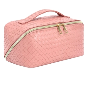 Pink woven texture large makeup bag with dual zippers and handle for travel storage