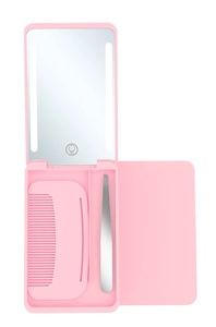 Close-up of pink portable LED makeup mirror box with hair comb and tweezers set