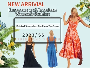 Detail of floral backless sundress with tie straps and tiered ruffled skirt