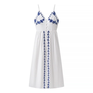 Bohemian white midi dress with blue floral embroidery and deep V-neckline