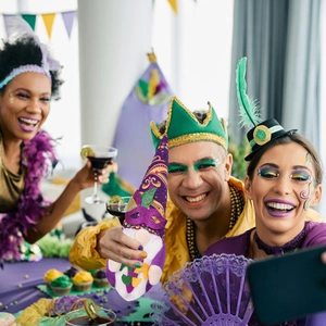 Mardi Gras gnome decoration with purple green and gold sequins for carnival party fun