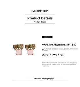 Detail view of pink cubic zirconia bow earrings with 3.2cm dimensions and copper base