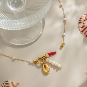Natural freshwater pearl necklace with red chili and golden shell pendants on gold chain