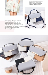 Detail of color block PU leather crossbody bag with elegant gold metal bar closure