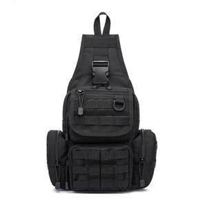 Detail of black tactical chest bag showing MOLLE system webbing and functional D-rings