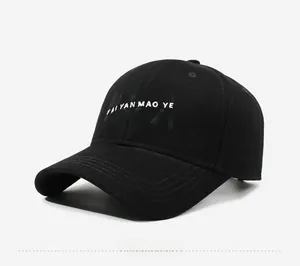Detail view of the 3D embroidered NYCA lettering on a black cotton baseball cap