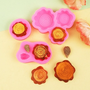 Detail showing wood stump tree ring silicone molds and finished pinecone baking tools