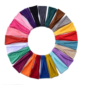 Elastic sweatbands for sports and yoga in various colors on a white background