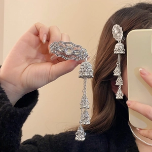 Ethnic style hair clip with hollow geometric design and jingling bell tassels