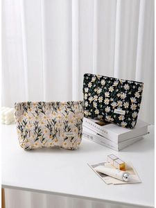 Kosmetiktaschen aus Baumwolle mit Gänseblümchen-Stickerei in Creme und Schwarz für Reisen