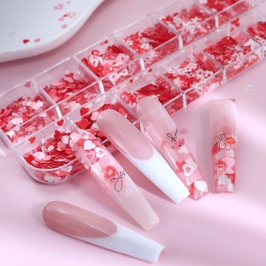 12-grid box of heart nail art sequins in pink and white for Valentine nail decoration