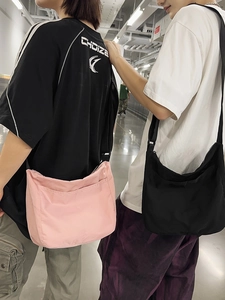 Minimalist large capacity nylon crossbody bag in pink and black for casual streetwear style