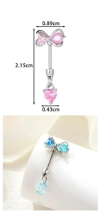 Detail view of heart and bow body piercing jewelry with dimensions 2.15cm height