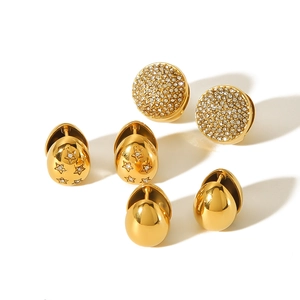 Three-piece gold plated stainless steel earring set with zircon studs and star engraved hoops