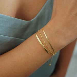 Three-piece set of 18K gold-plated stainless steel bracelets with LOVE DREAM engraving