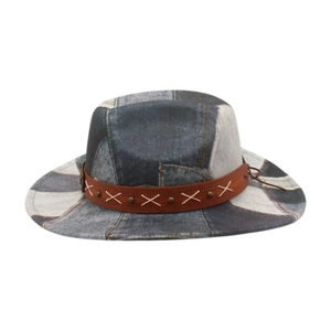 Retro patchwork denim cowboy hat with brown leather band and metallic rivet details