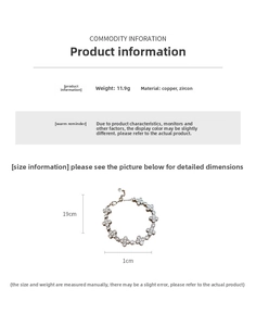 Detailed view of zircon clover bracelet with 19cm length and 1cm flower links
