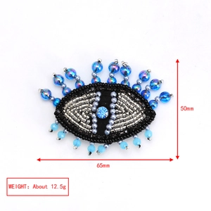 Detailed evil eye brooch embroidery with blue beads and crystals, dimensions 65x50mm