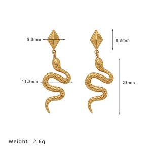 Macro shot showing dimensions and scale of 18K gold-plated snake drop earrings