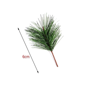 Green artificial pine needle branch 6cm length for DIY Christmas decor on white background