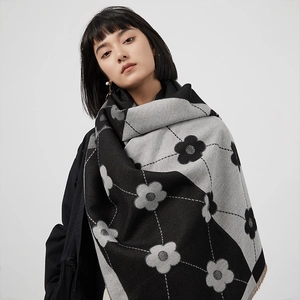 Faux cashmere shawl featuring black and grey color block patterns with floral embroidery