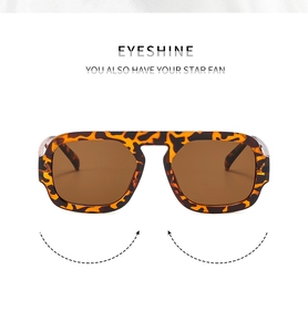Detailed close-up of retro square tortoise shell frames with dark brown lenses