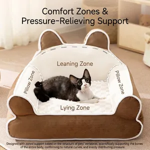 Plush cat-ear shaped pet bed in brown and cream with a cat resting in a cozy home setting