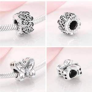 Macro shot of S925 sterling silver butterfly charms with sparkling cubic zirconia detail