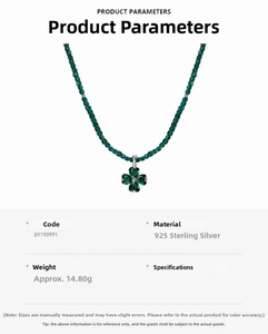 Detail view of S925 sterling silver clover necklace with emerald green beads and crystal pendant