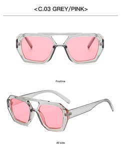 Detail view of pink lenses and transparent grey double bridge irregular sunglasses