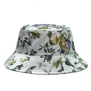 Floral print bucket hat with pear and leaf patterns on light grey fabric for women