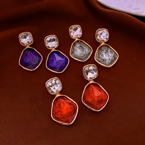 Three pairs of vintage geometric resin drop earrings with brushed texture and gold edges