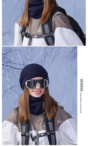 Close-up of navy knit beanie and neck warmer set for winter outdoor skiing