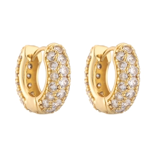 Macro detail of luxury gold-plated hoop earrings featuring multi-row micro-pave white zircons