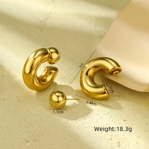 Detail showing 3cm gold hollow C-shaped hoops and 1.1cm round stud earrings set