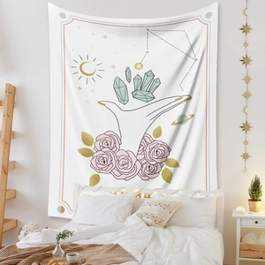 Detail of Libra zodiac tapestry featuring digital floral and crystal prints on white fabric
