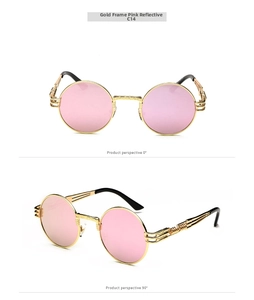 Macro view of retro round metal sunglasses with pink reflective lenses and cutout temples