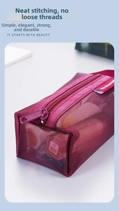 Macro detail of dark red mesh material with textured square structure and metal zipper