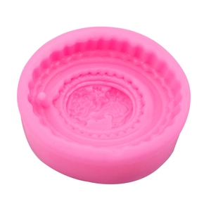 Pink silicone mold for fondant cake and soap featuring elegant oval cameo portrait design
