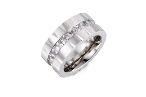 Detail of wide brushed silver titanium steel ring featuring a row of square zirconias
