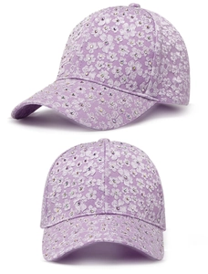 Detail of lavender baseball cap featuring floral lace textures and sparkling rhinestones