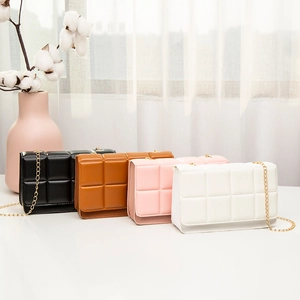 Quilted crossbody bags with gold chains in black, brown, white and pink colors