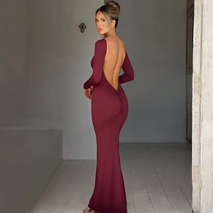 Detailed back view of a slim-fit wine red backless long dress with ruched butt details