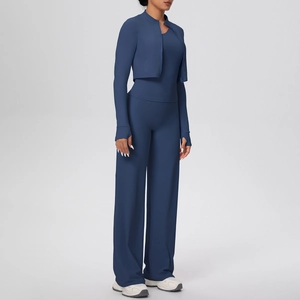 Detailed view of women's 3-piece yoga set with thumbhole sleeves and high waist trousers
