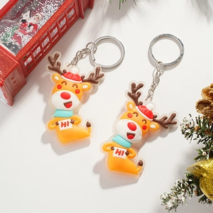 Christmas reindeer keychain set with cartoon 3D charms and metal rings in festive decor