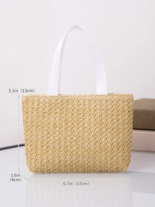Detail view of woven straw tote bag with size guide: 17cm length by 13cm height