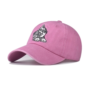 Pink washed cotton baseball cap featuring detailed cat face embroidery on front panel